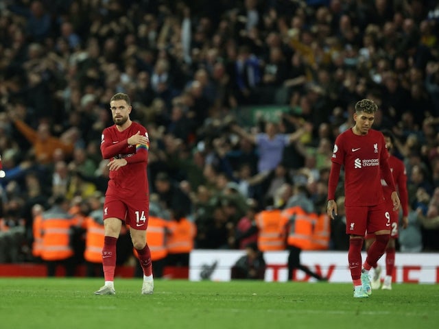 Liverpool's Jordan Henderson and Roberto Firmino looks dejected after Leeds United scored their second goal on October 29, 2022
