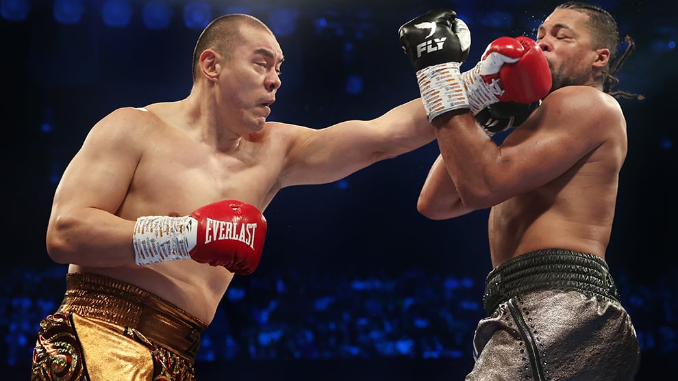 Zhilei Zhang lands his left hand on Joe Joyce at the Copper Box Arena on April 15, 2023, in London, England